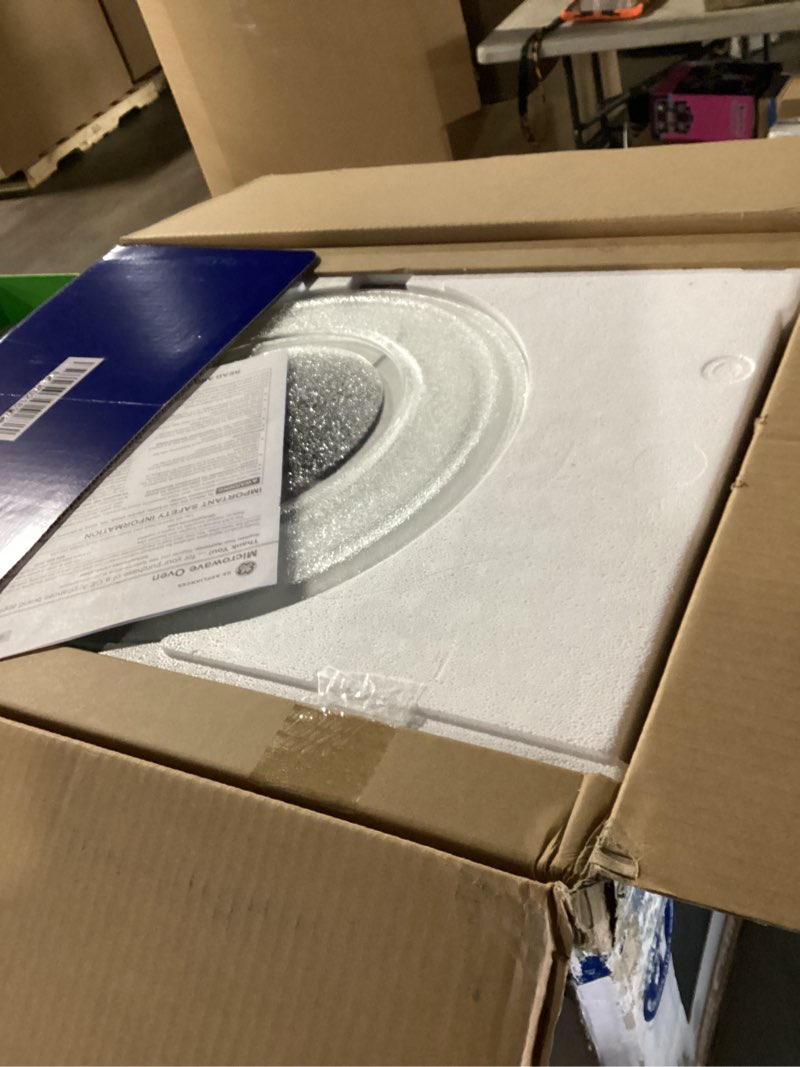 Condition photo showing New/Like New for GE Countertop Microwave Oven,1, 200-watt Capacity, 2.0 Cubic Ft., 8 Auto Setting Cooking Settings, Child-Lock Technology, Kitchen Essentials for the Countertop, Dorm Room or Apartment, Stainless Steel 2.0 Cu.Ft. Stainless Steel