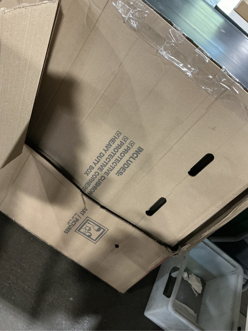 Condition photo showing As Is for the home depot 65 lb. tv box