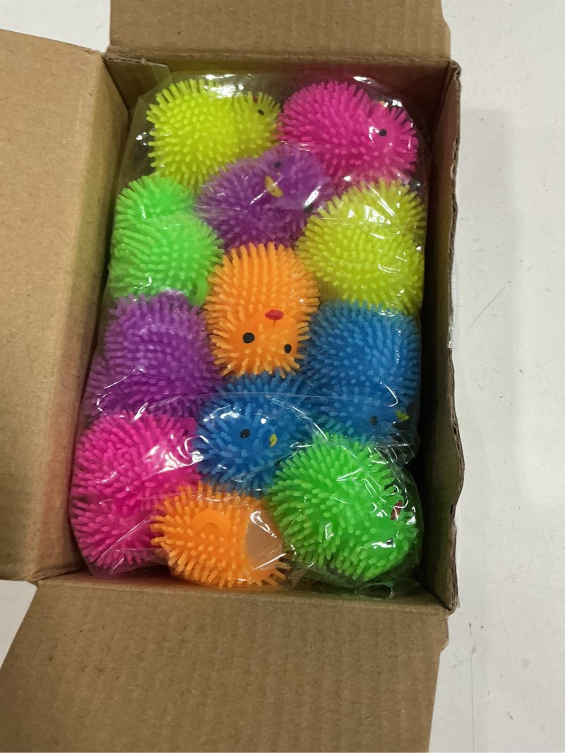 Condition photo showing New/Like New for 12 pack easter eggs filled led chick duck puffer balls easter egg fillers toys, light up stress relief fidget toys squeeze ball easter basket stuffers for kids boys girls easter eggs hunt party favors 12 pack led puffer toys