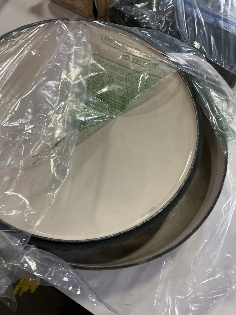 Condition photo showing As Is for lodge 3.6 quart enameled cast iron round casserole with lid– dual handles – oven safe up to 500° f or on stovetop - use to marinate, cook, bake, refrigerate and serve – oyster white