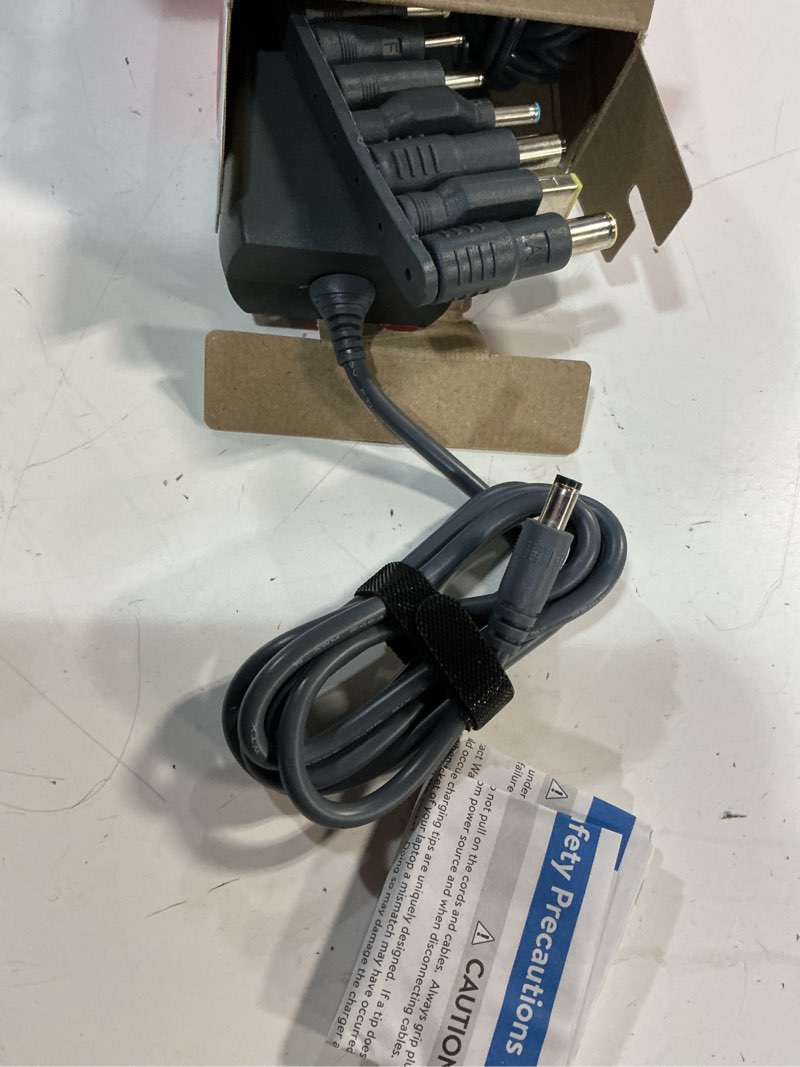 Condition photo showing Good Condition for onn 90w laptop charger with 10 interchangeable tips  10 ft power cord for hp  dell  lenovo  laptop