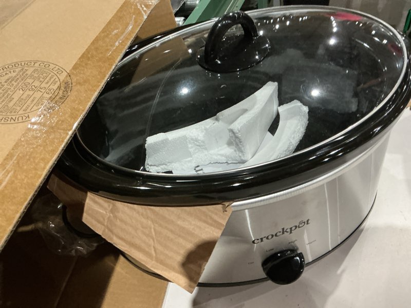 Condition photo showing As Is for quart manual slow cooker, stainless steel