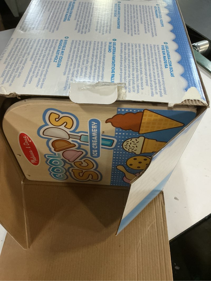 Condition photo showing New/Like New for Melissa & Doug Cool Scoops Ice Creamery, Wooden Ice Cream Shop & Counter with Play Food & Play Kitchen Accessories, Preschool Learning Toys for Girls & Boys 3+ - FSC Certified