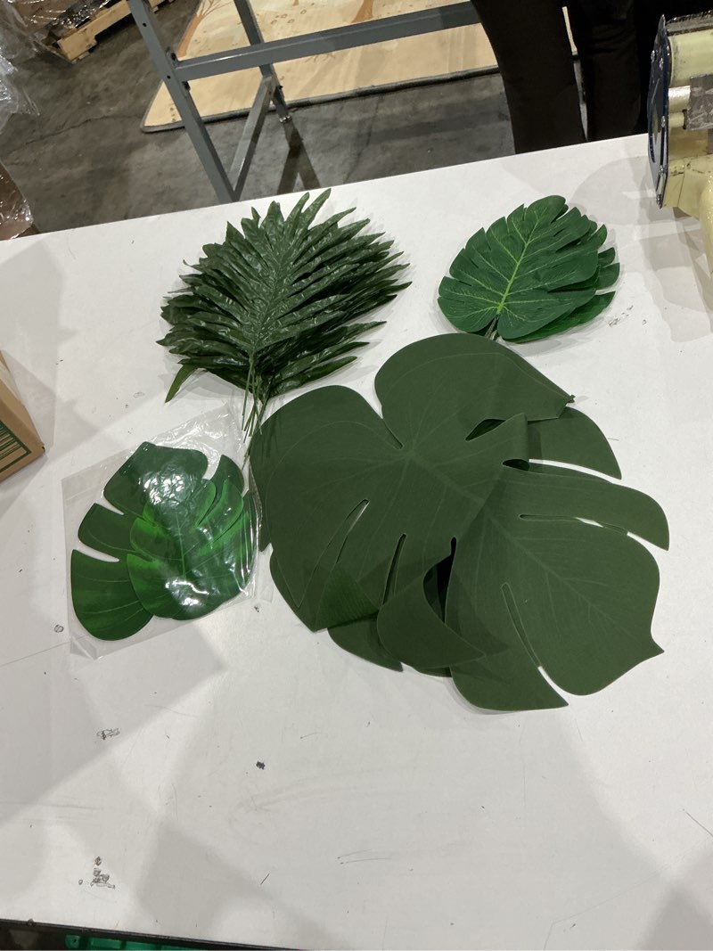 Condition photo showing Good Condition for 15 pcs palm leaves, artificial tropical monstera fake leaves artificial palm leaves small green fake palm leaf party table decoration