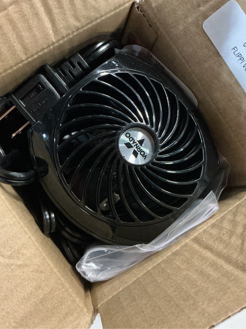 Condition photo showing As Is for vornado flippi v6 compact air circulator fan, adjustable head, 2 speeds, black