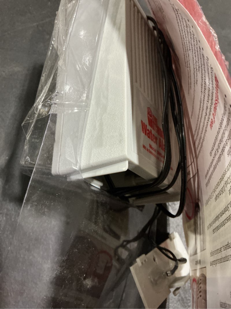 Condition photo showing As Is for battery-operated water alarm sump accessory
