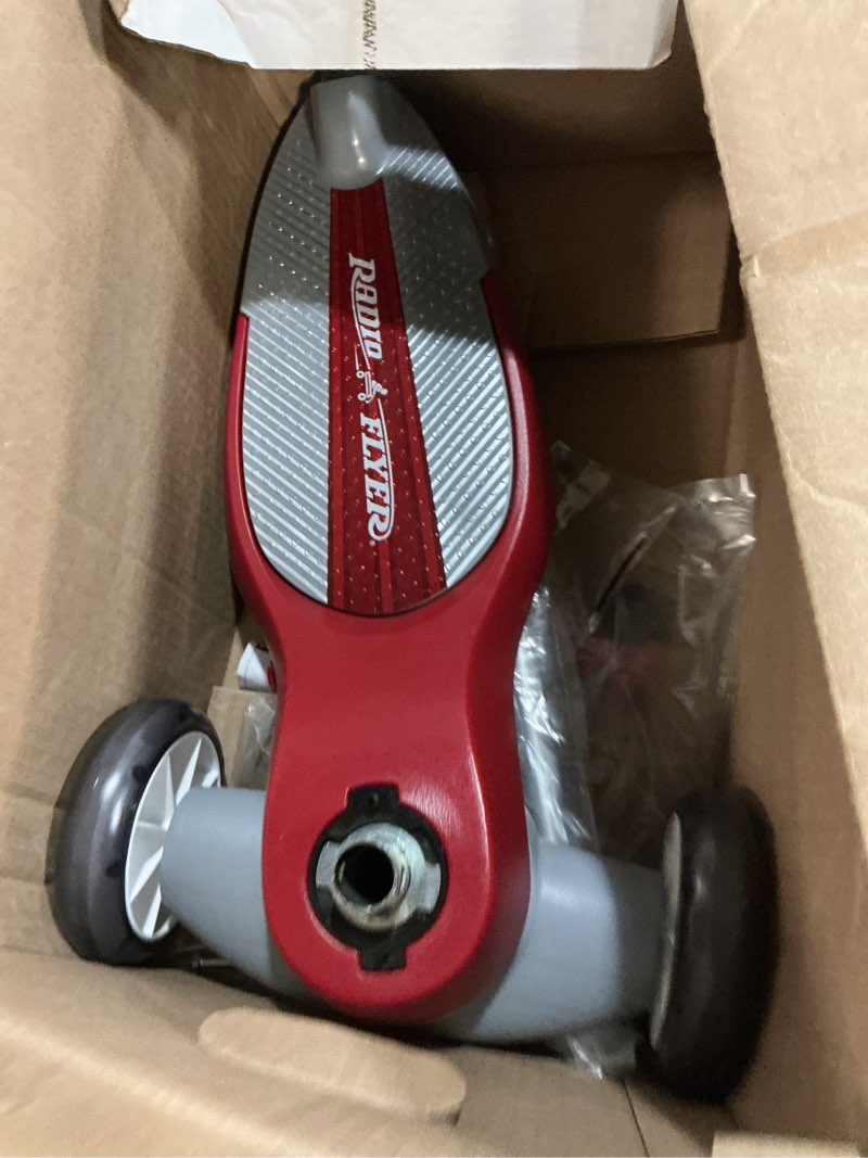 Condition photo showing As Is for radio flyer my 1st scooter, red, for kids 2-5 years old, extra wide base for balance, 2 front wheels for added stability, easy to use foot brake, 3 wheel scooter for kids, (amazon exclusive)