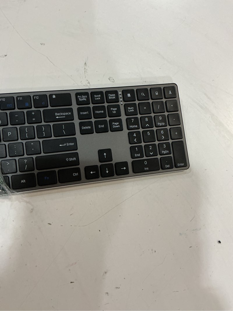 Condition photo showing As Is for amazon basics ultra premium wireless keyboard and mouse combo - rechargeable, ultra slim design, quiet, full size, number pad, unifying receiver, black qwerty