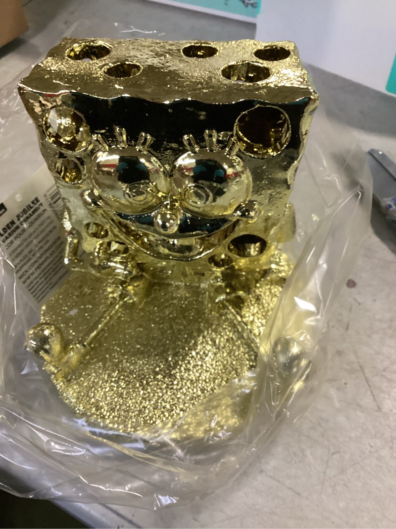 Condition photo showing New/Like New for Nickelodeon golden Sponge jubilee aquarium Ornament