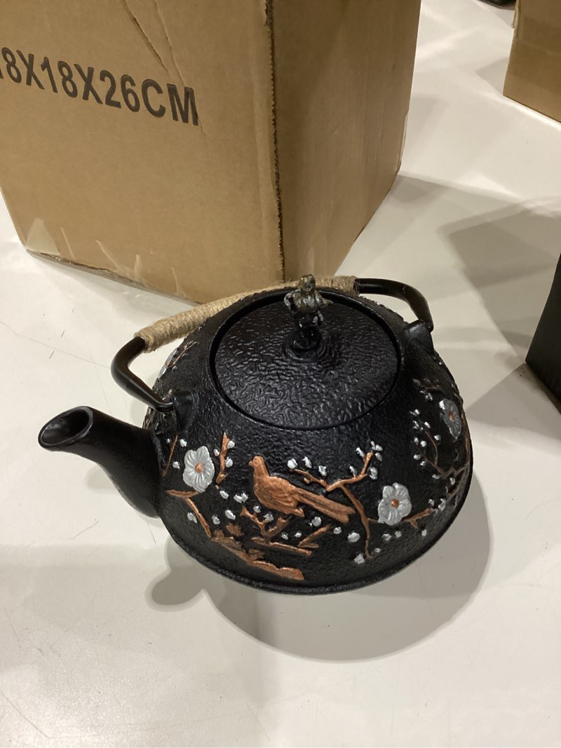 Condition photo showing New/Like New for Dyna-Living Cast Iron Teapot with Warmer Japanese Tea Kettle 720ml/24.5oz Japanese Cast Iron Teapot Set with 2 Tea Cups Tea Pot with Infuser Tea Kettle for Wood Stove or Stovetop Style 3 720ml (24.5oz)