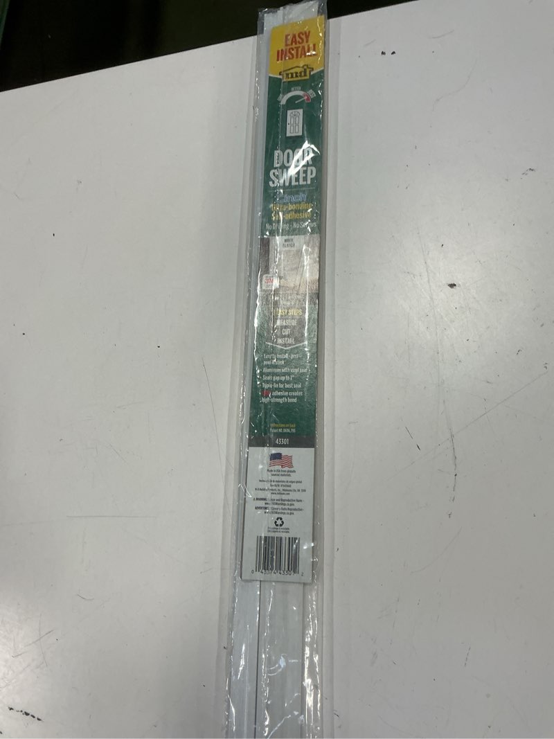 Condition photo showing Good Condition for M-D Building Products Cinch White Aluminum/Vinyl Weatherstrip For Doors  Doors 36 in. L x 1/4 in.