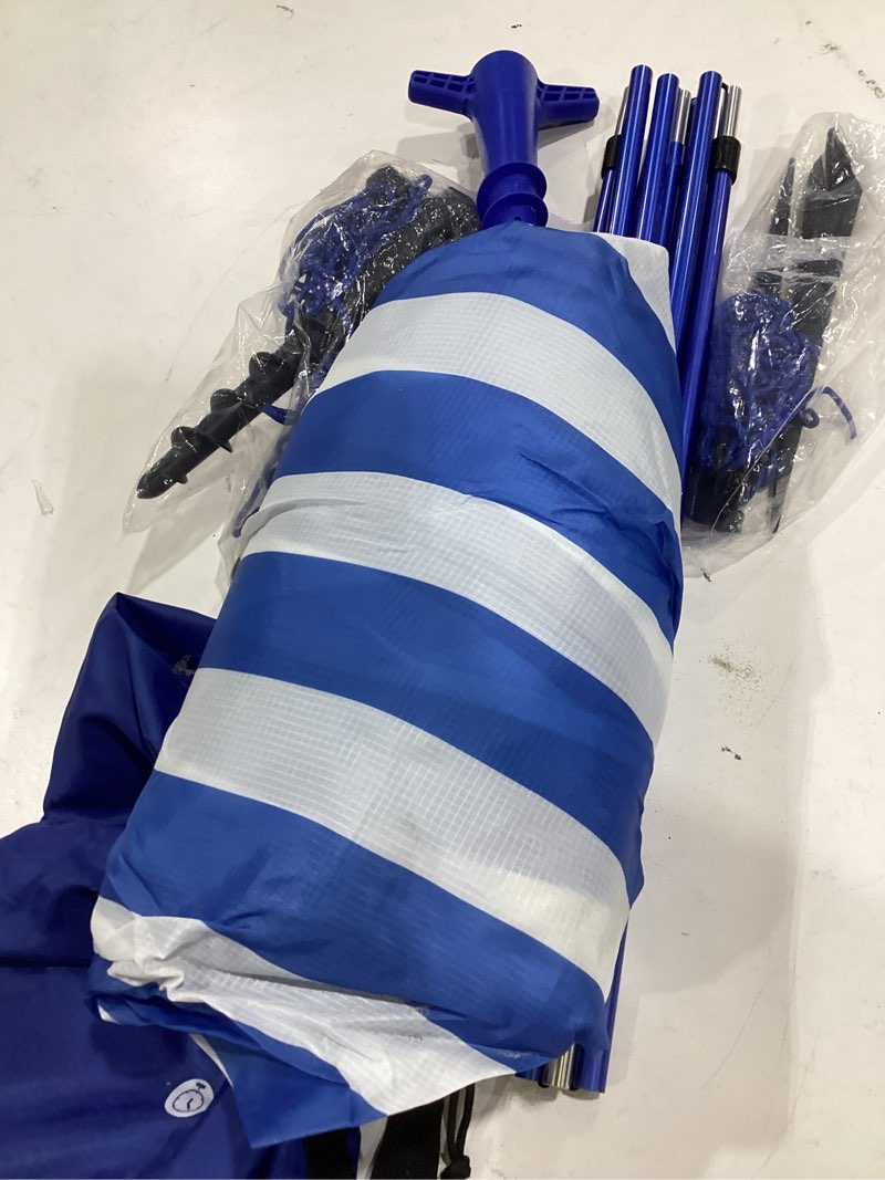 Condition photo showing As Is for beach wind-powered shade canopy, portable sun shelter tent, upf 50+ uv protection, lightweight, easy set up, 150 sq. ft. of shade for up to 6 people, regatta manta rays 1-regatta stripe 150 square feet