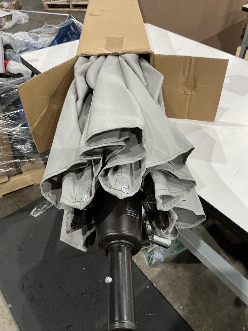 Condition photo showing Good Condition for origin 21 11-ft aluminum gray auto-tilt market patio umbrella