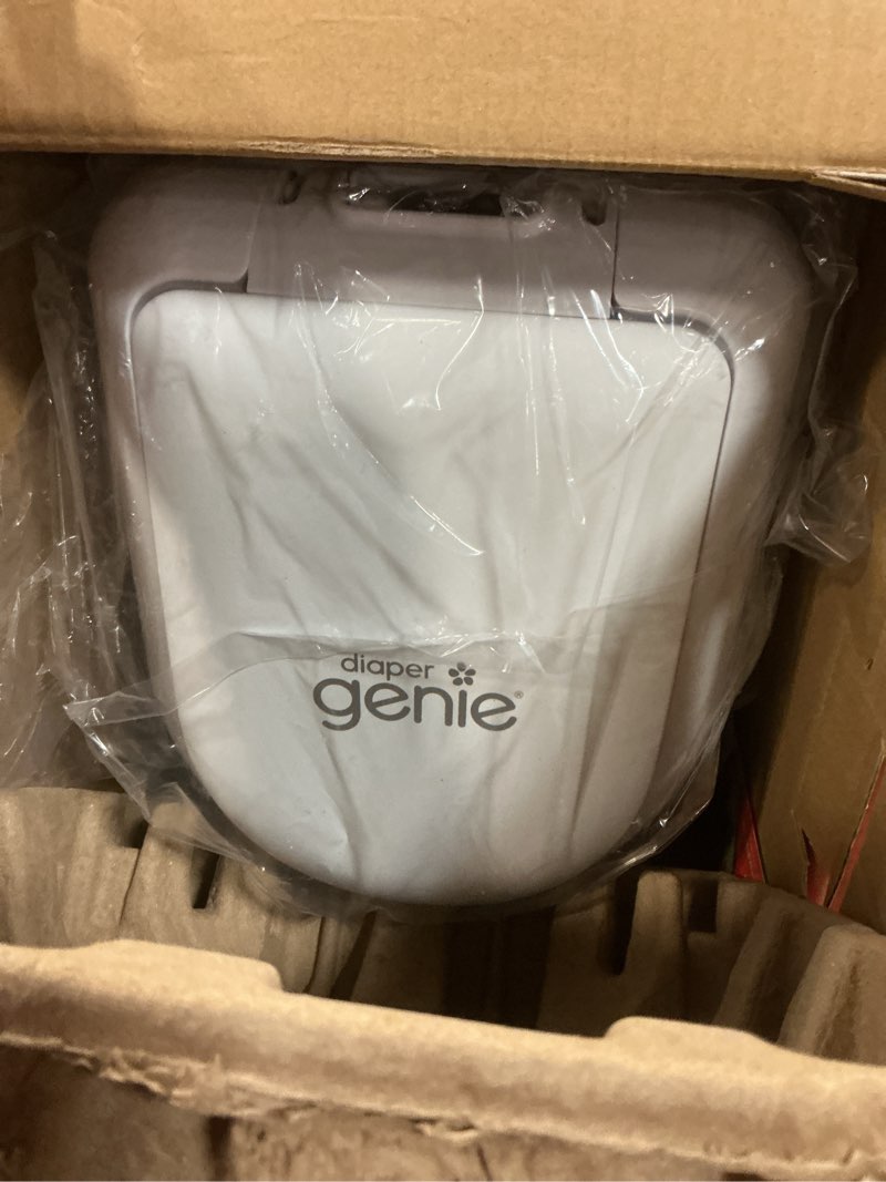 Condition photo showing Good Condition for Diaper Genie Platinum Pail (Lily White) is Made in Durable Stainless Steel and Includes 1 Easy Roll Refill with 18 Bags That can Last up to 5 Months.