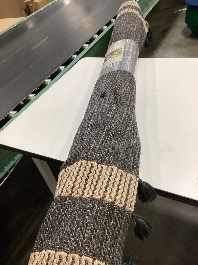 Condition photo showing As Is for 7'x10' pecan rectangular woven area rug charcoal gray - threshold ?