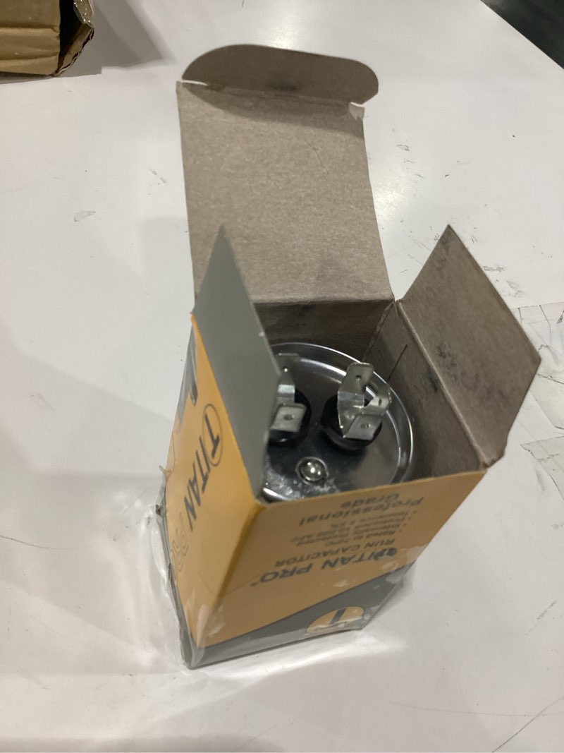Condition photo showing Good Condition for titan pro round motor run capacitor, 25 microfarad rating, 370-440vac voltage - trcf25