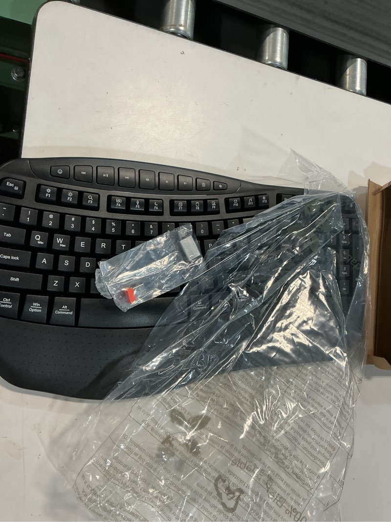 Condition photo showing New/Like New for meetion wireless ergonomic keyboard, wave keys firm wrist rest for natural typing, 2.4g usb-a cordless receiver and usb-c adapter, ergo computer keyboard compatible with windows/mac/pc/laptop, black wave black