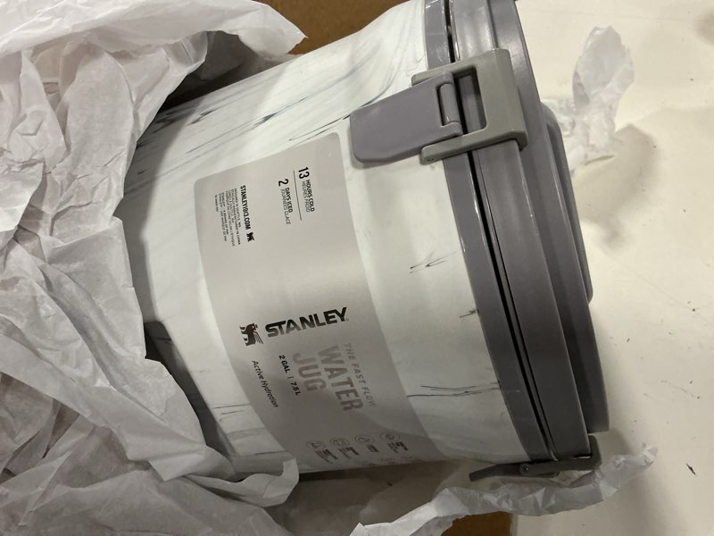Condition photo showing New/Like New for stanley adventure fast flow water jug | leakproof ice water dispenser | insulated beverage cooler | easy pour spigot and latched foam lid | bpa-free chalk