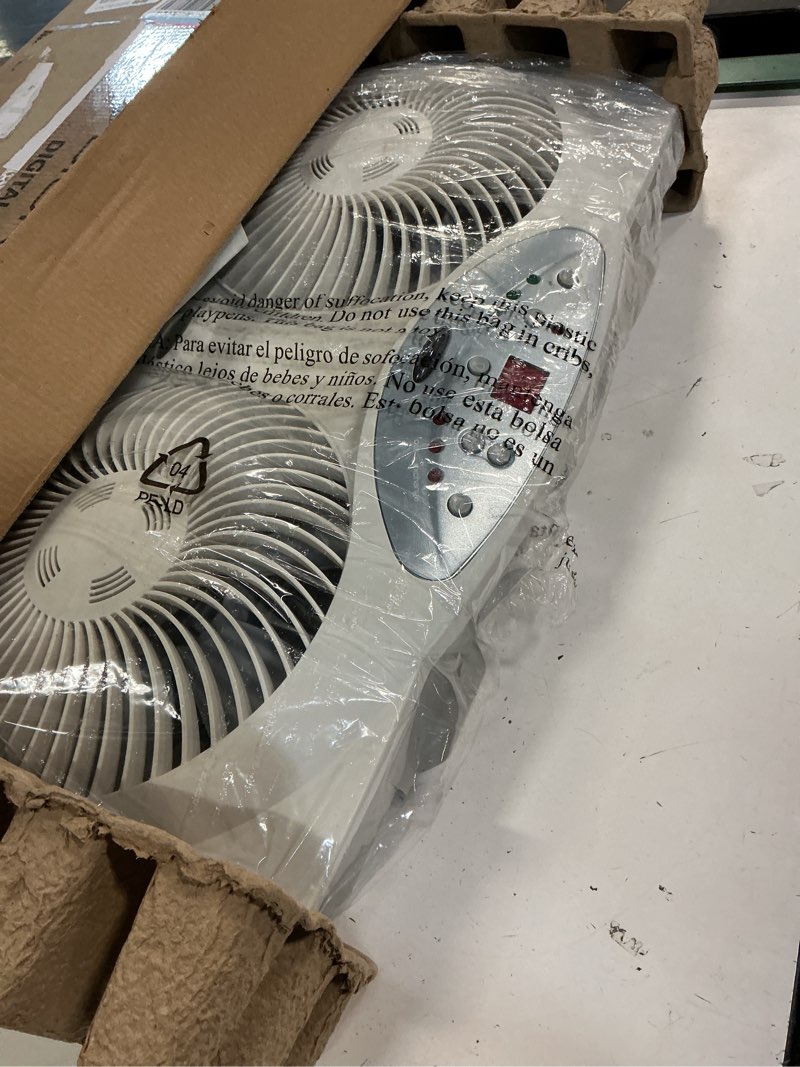 Condition photo showing Good Condition for bionaire window fan with reversible airflow blades – 3-speed settings, programmable thermostat, led display, remote control, fits 24–36" windows, no assembly required white 2 blades electronic control with lcd screen window fan