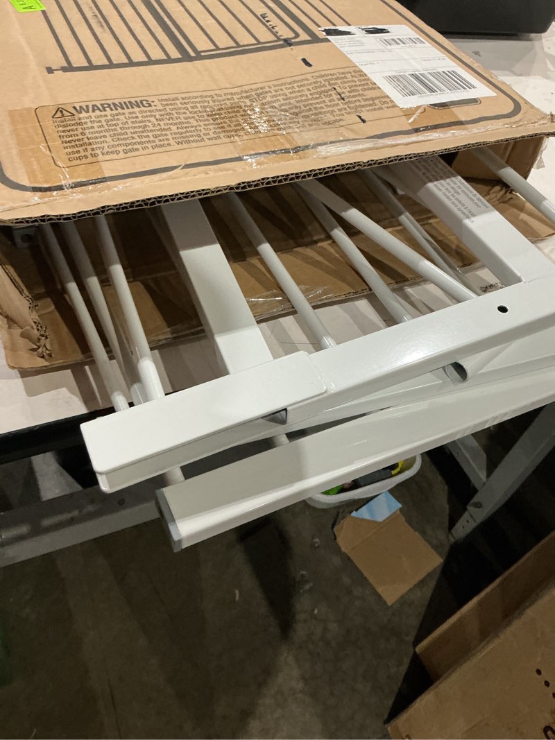 Condition photo showing As Is for regalo safety 29-38.5" baby gate for doorways & bottom of stairs, pressure mounted baby gate with door for babies, toddlers & pets, tested & safe for 30 years, american designed, american owned, white white 29-38.5"w x 30"h