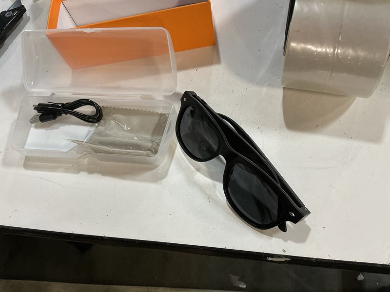 Condition photo showing As Is for weariq bluetooth smart glasses – matte black audio sunglasses – black polarized lenses, open-ear speaker, 10-hour playtime, hands-free calls, voice assistanthands-free calls & music