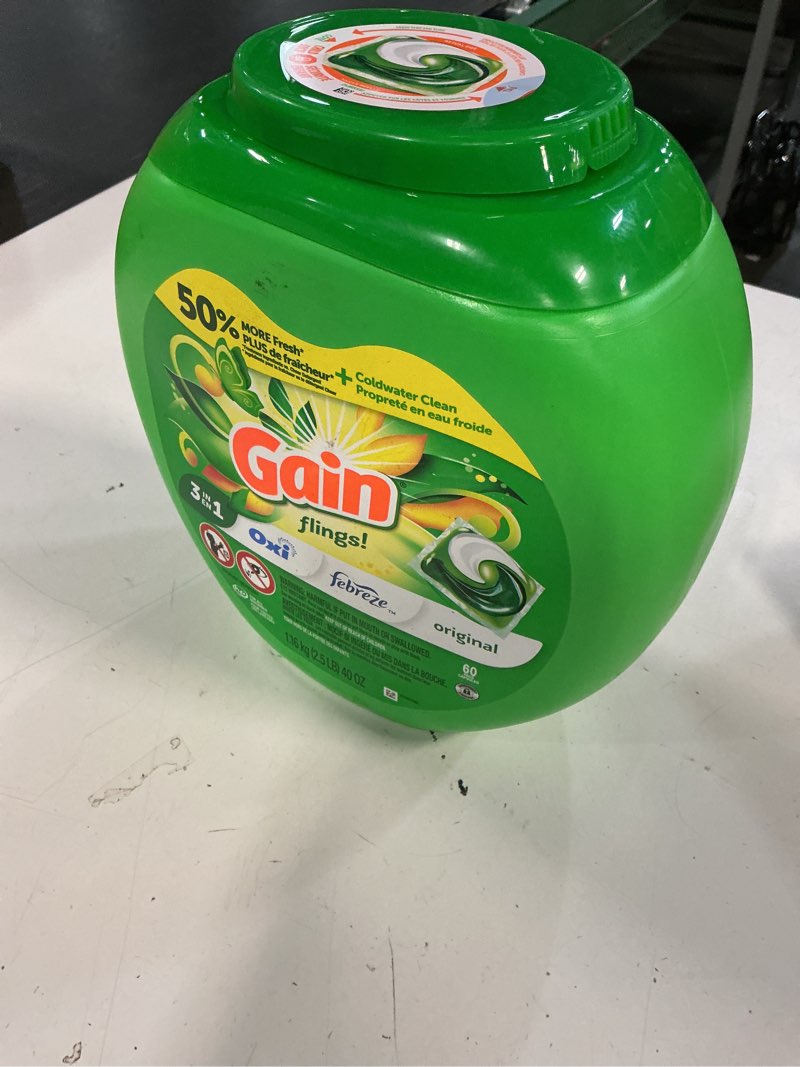 Condition photo showing New/Like New for gain flings liquid washing detergent pacs, now with odor defense + color guard, original scent, 4-in-1 liquid laundry detergent pods, clean & fresh, 60 count (packaging may vary) original 60 count (pack of 1)