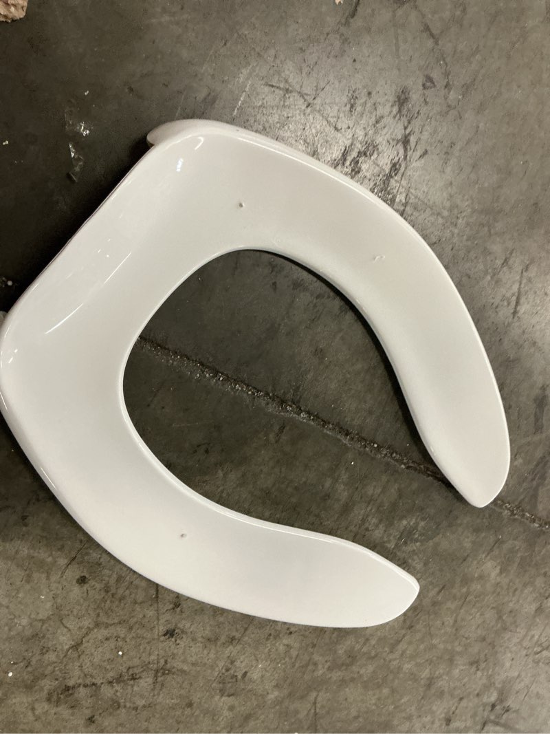 Condition photo showing As Is for commercial plastic toilet seat with self sustaining check hinge, white