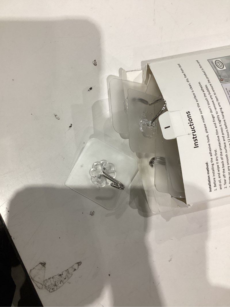 Condition photo showing Good Condition for 24 Pack Self Adhesive Hooks Heavy Duty - 33lb Max, Transparent, Waterproof, Sticky Wall Hooks for Keys, Bathroom, Shower, Outdoor, Kitchen, Door, Home Improvement, Utility