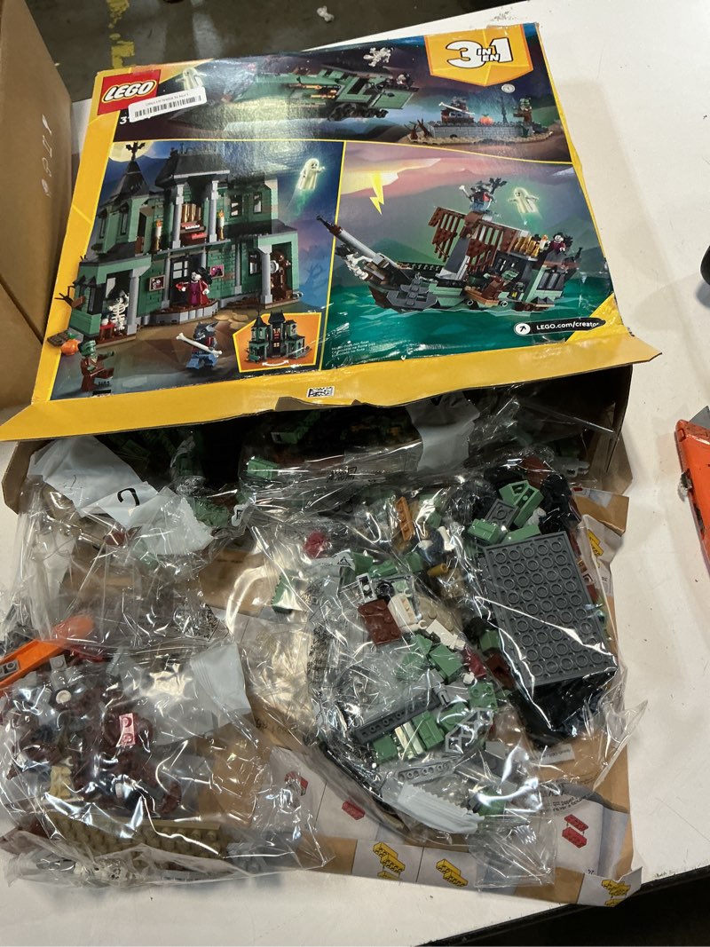 Condition photo showing As Is for lego creator 3 in 1 haunted mansion building toy for kids - halloween building blocks & learning toy for girls & boys, ages 9+ - build a haunted house, train, or ship - gift for birthdays - 31167