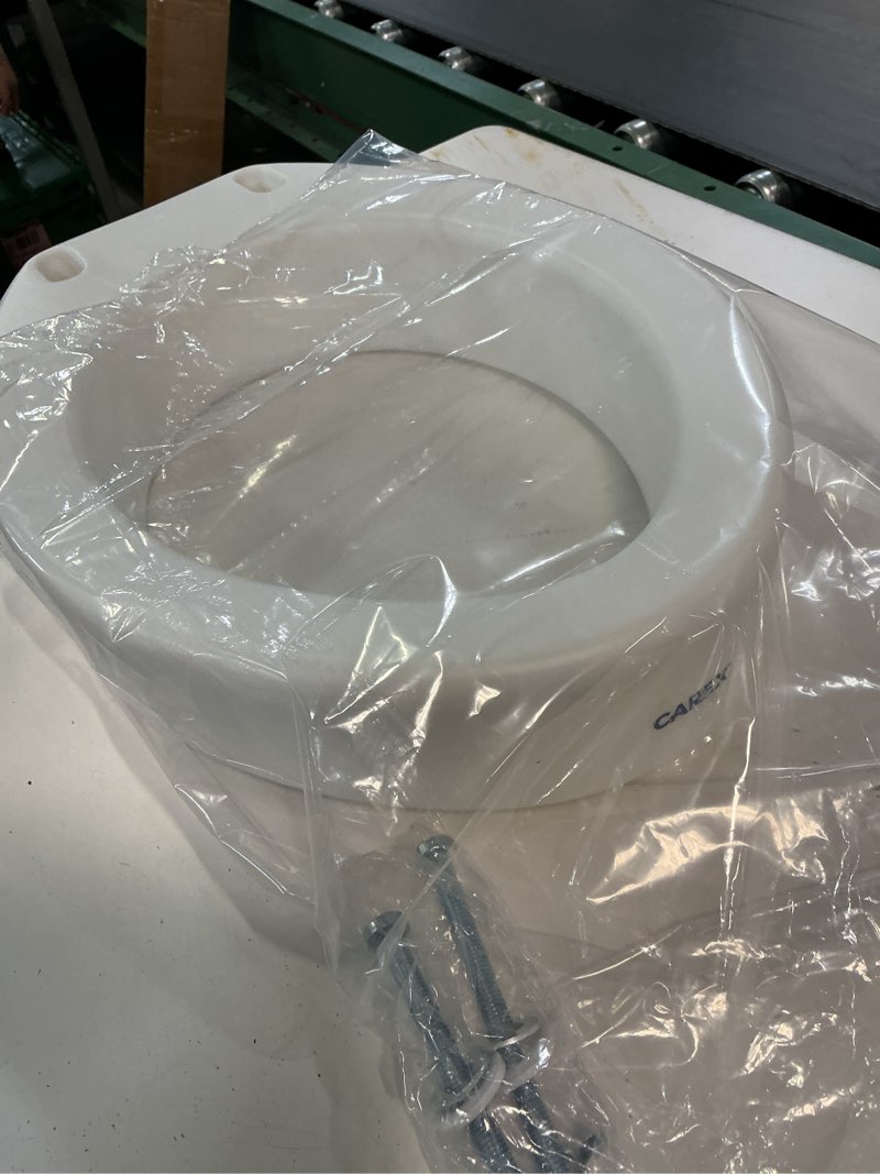 Condition photo showing Good Condition for carex toilet seat riser, round raised toilet seat adds 3.5 inches to toilet height, for assistance bending or sitting, 300 pound weight capacity toilet riser