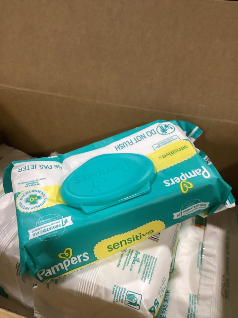 Condition photo showing As Is for pampers sensitive baby wipes, water based, hypoallergenic and unscented, 8 flip-top packs, 4 refill packs (1008 wipes total) 84 count (pack of 12)