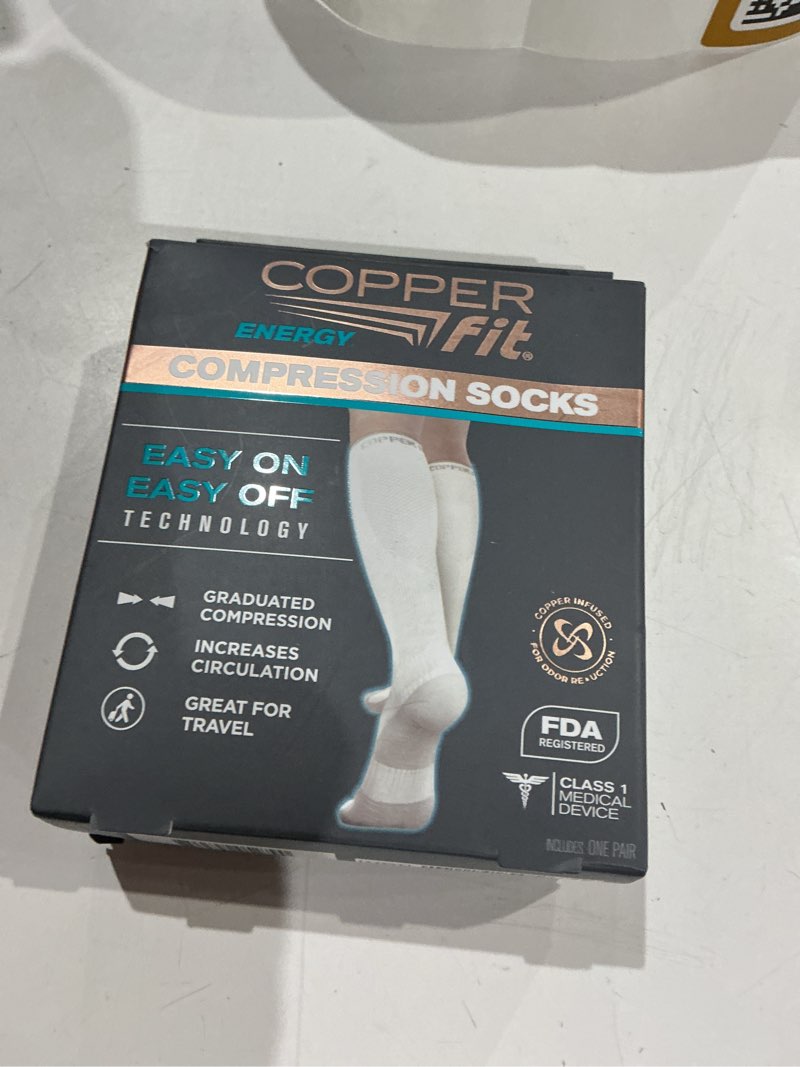 Condition photo showing Good Condition for copper fit energy compression socks, white, l/xl, unisex