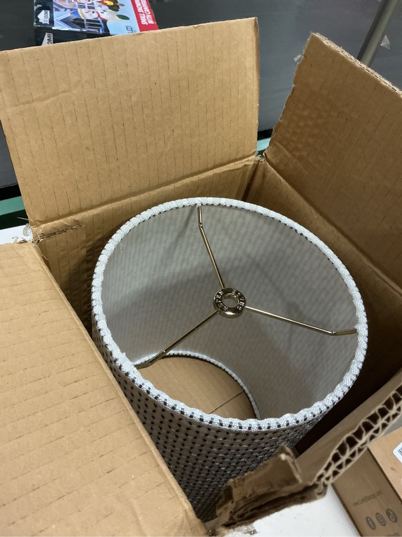 Condition photo showing item condition for Aspen Creative 31615 Transitional Drum (Cylinder) Shaped Spider Fitter Lamp Shade in White & Grey Jacquard Textured, 8" wide (8" x 8" x 11")