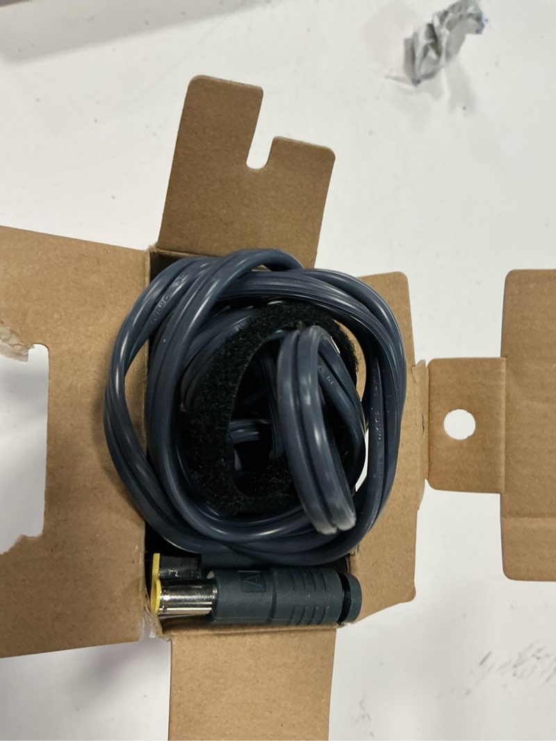 Condition photo showing As Is for onn. 65w laptop charger w/10 interchangeable tips, 10 ft power cord for hp, dell, lenovo laptops