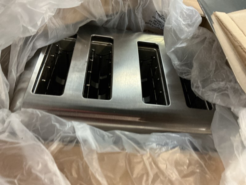 Condition photo showing Good Condition for waring (wct708) four-compartment pop-up toaster, silver classic