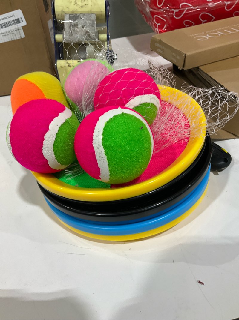 Condition photo showing As Is for Aneco Toss and Catch Paddle Game Set Disc Paddles and Toss Ball Sport Game with Storage Bag, 6 Paddles and 6 Balls Black/Blue/Yellow