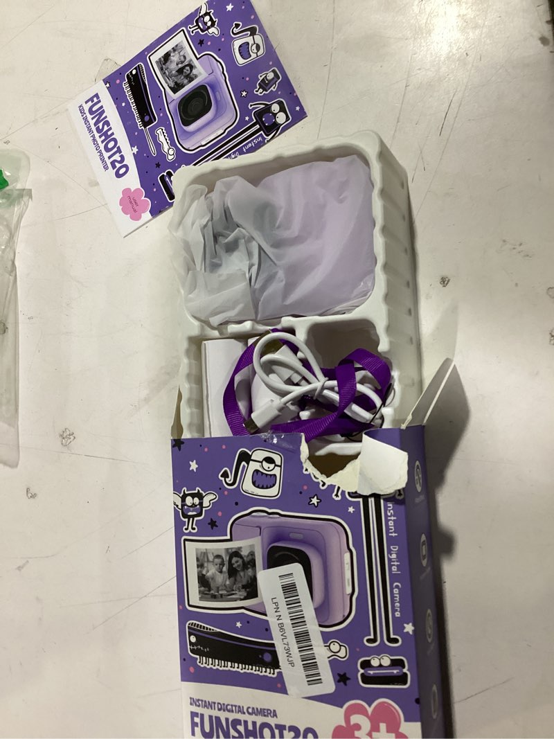 Condition photo showing As Is for instant print camera for kids, christmas birthday gifts for girls boys age 3-12, typonos kids cameras, portable toy camera for 3 4 5 6 7 8 9 10 year old girl with 32gb sd card, purple