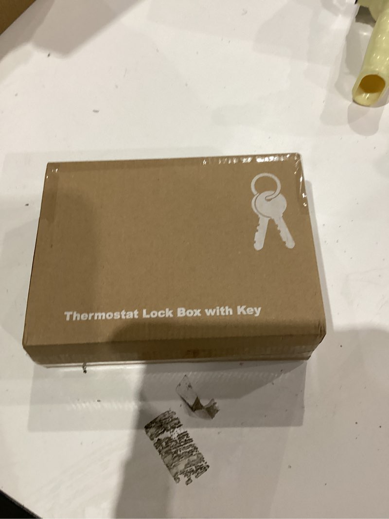 Condition photo showing As Is for TRJ Large Thermostat Lock Box with Key, Clear Thermostat Cover with Lock for Thermostat on Wall, Lockable Thermostat Lock Box Cover, AC Lock Box Cover with Key Fit Thermostats 5" H x 6.3" W or Smaller 1 PCS Key Lock Box