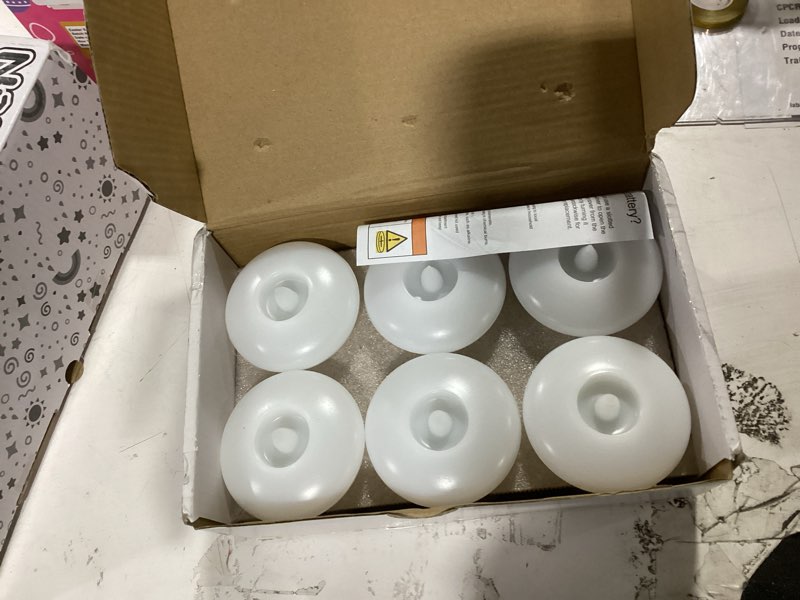 Condition photo showing Good Condition for homemory 12 pack 3” flameless led floating candles, 200 hour white battery operate waterproof tealights for cylinder vases, centerpieces at wedding decor, party, pool white base 12 pack