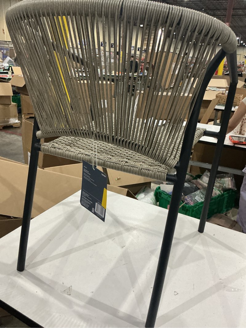 Condition photo showing As Is for style selections pelham bay wicker stackable matte black steel frame stationary dining chair with woven seat