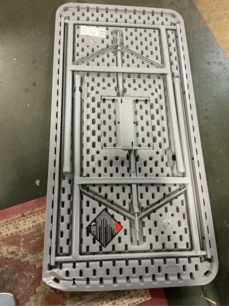 Condition photo showing As Is for Cosco 2-ft x 4-ft Indoor or outdoor Rectangle Resin Gray Folding banquet table 4 -Person