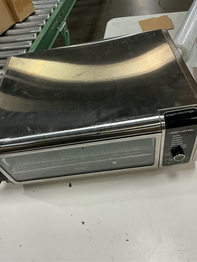 Condition photo showing As Is for ninja ft102a foodi 9-in-1 digital air fry oven with convection oven, toaster, air fryer