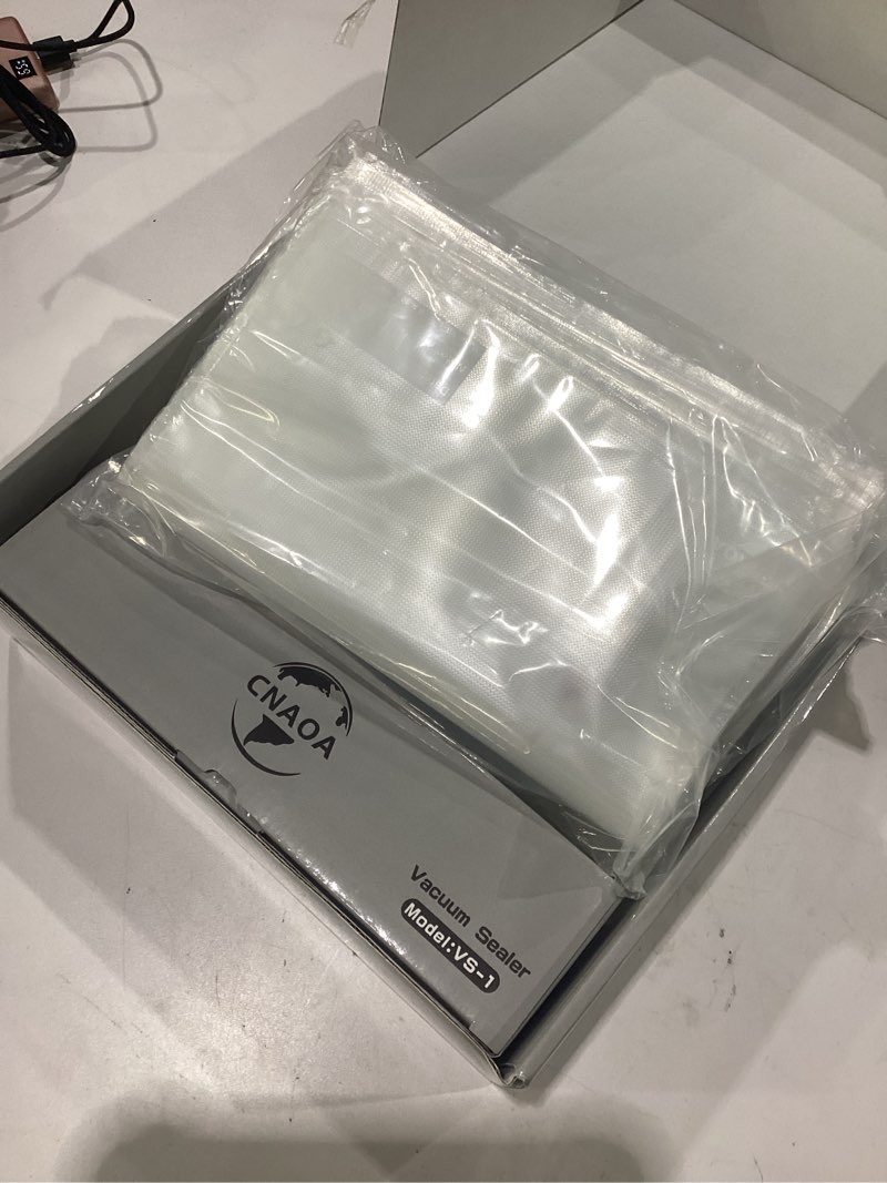 Condition photo showing New/Like New for compact vacuum sealer with 30 3rd-gen upgraded reusable high seal bags, powerful handheld vacuum sealer machine, keeps food fresh up to 6x longer, portable meal saver, seal meal saver vacuum sealer + 30 bags