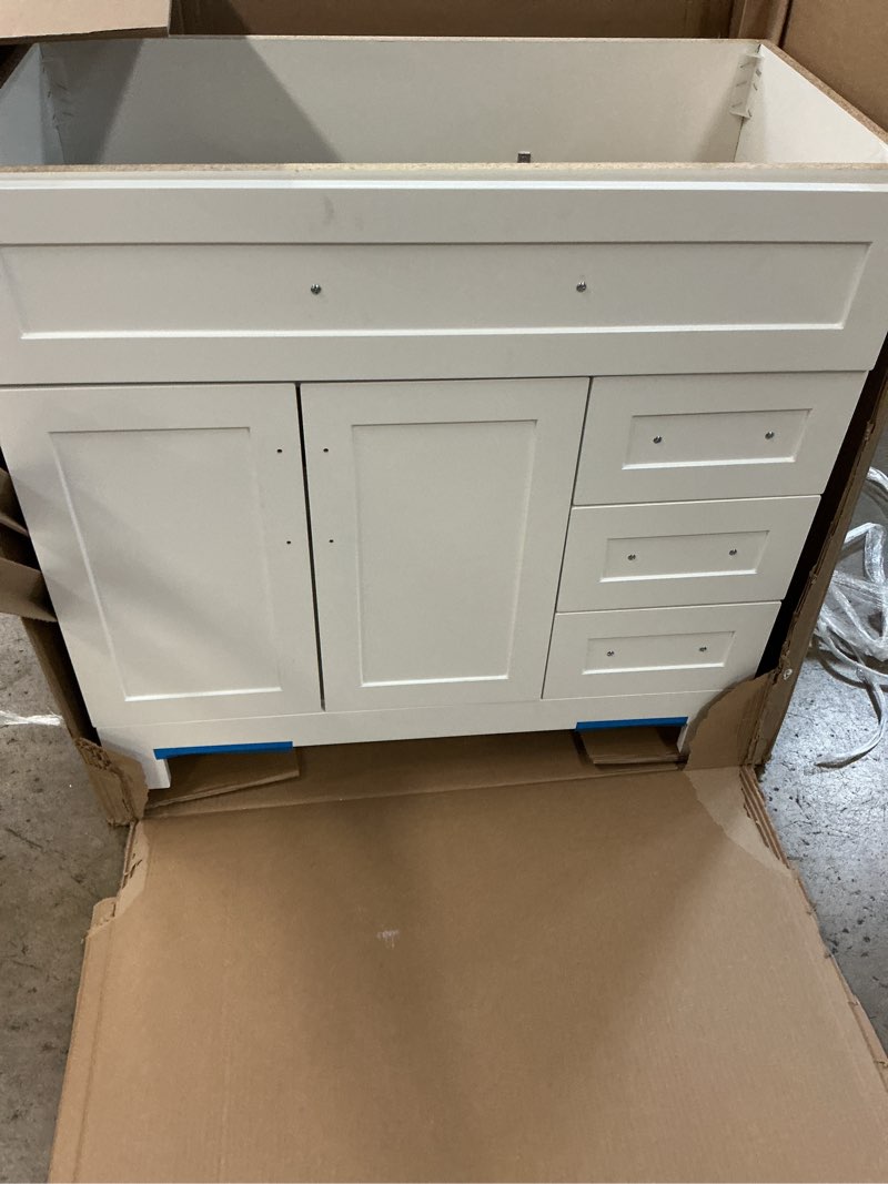 Condition photo showing Good Condition for  style selections cauley 36-in true white single sink bathroom vanity with white cultured marble