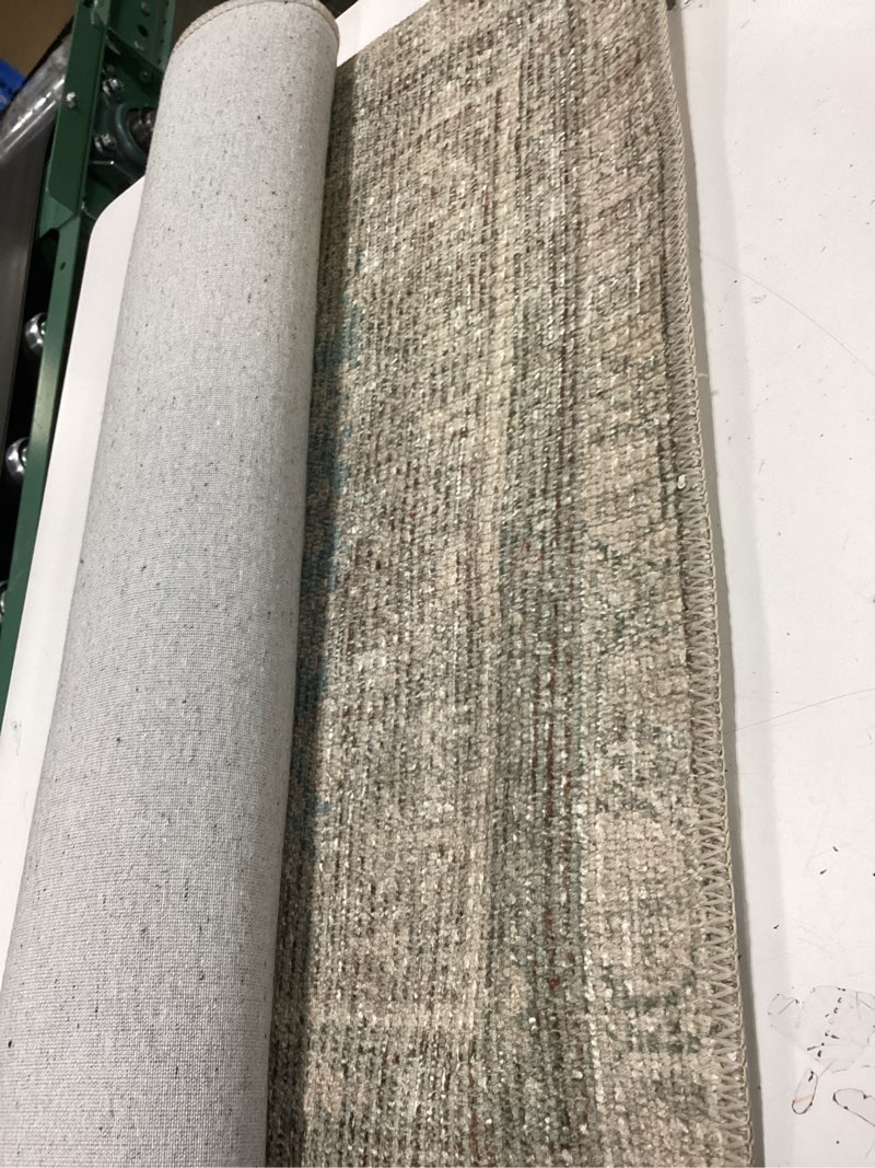 Condition photo showing item condition for Loloi Angela Rose Aubrey Collection AUB-03 Jade/Natural 2'-6" x 7'-6", .19" Pile Height, Runner Rug Jade / Natural 2'6" x 7'6" (Rectangular)