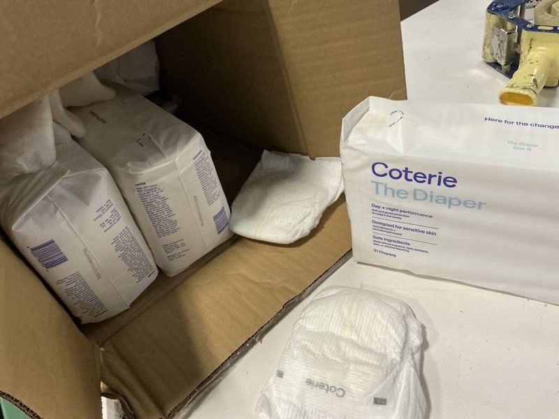Condition photo showing As Is for newborn ultra soft diapers starter kit, 1-month supply