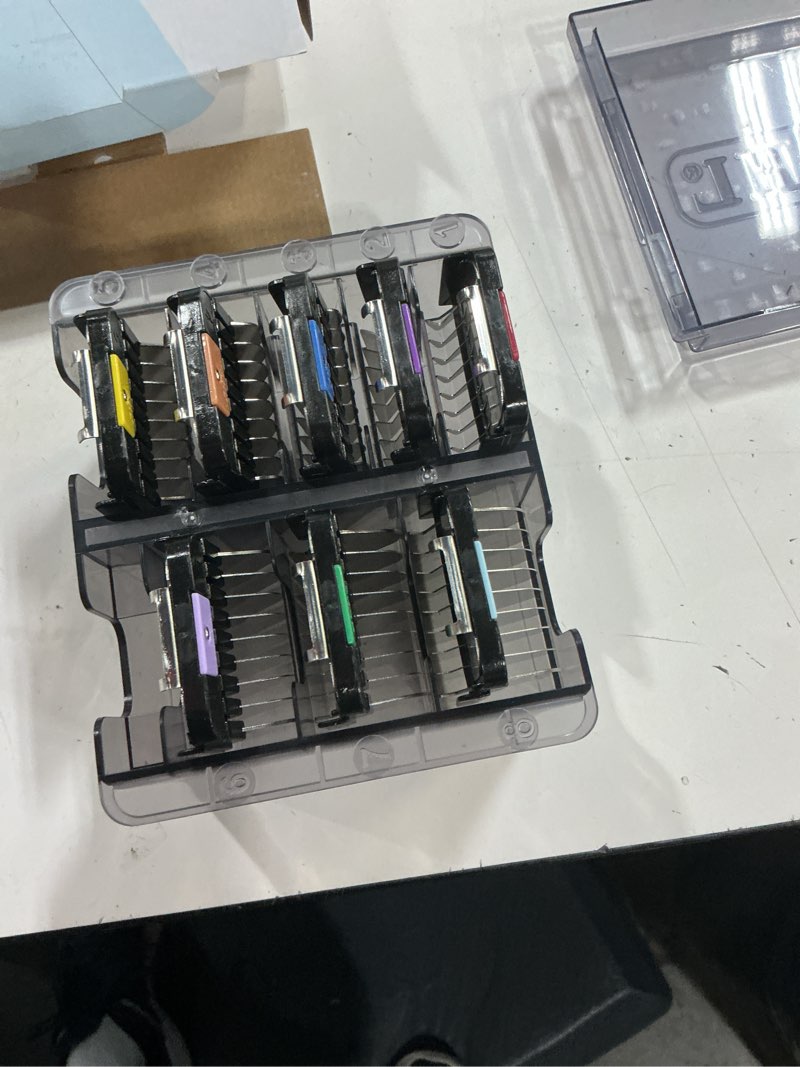 Condition photo showing New/Like New for wahl pro animal stainless steel attachment combs - 8 cutting lengths - color-coded dog & cat clipper guides - animal grooming essentials - snag-free cutting - multicolor 2