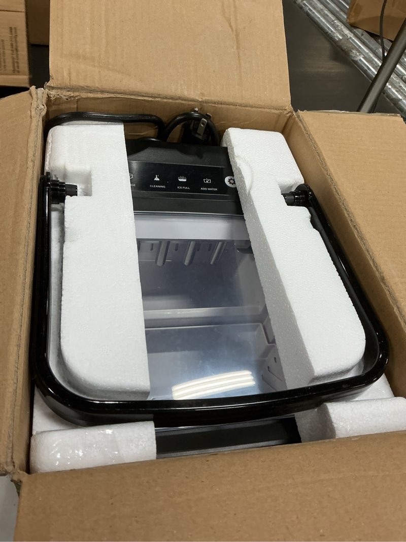 Condition photo showing Good Condition for igloo premium self-cleaning countertop ice maker machine, handled portable ice maker, produces 26 lbs. in 24 hrs. with ice cubes ready in 6-8 minutes, comes with ice scoop and basket black 26 lb handle