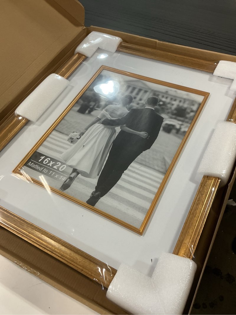 Condition photo showing As Is for Yaetm 16x20 Gold Picture Frame with Decorative Inner Frame & Tempered Glass, Display 11x14 Photos with Mat on Wall - Portrait or Landscape - Ideal for Office & Home Décor (Vintage Gold, Single) 16x20 - 1 pack Vintage Gold