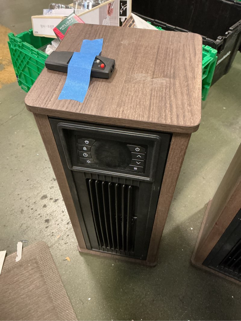 Condition photo showing As Is for Utilitech infrared wood tower heater